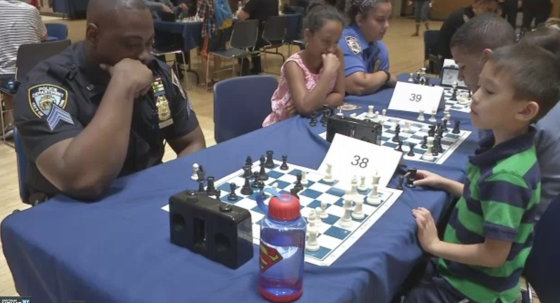 Image for Cops Square off Against Kids in Chess Tournament at Police Headquarters
