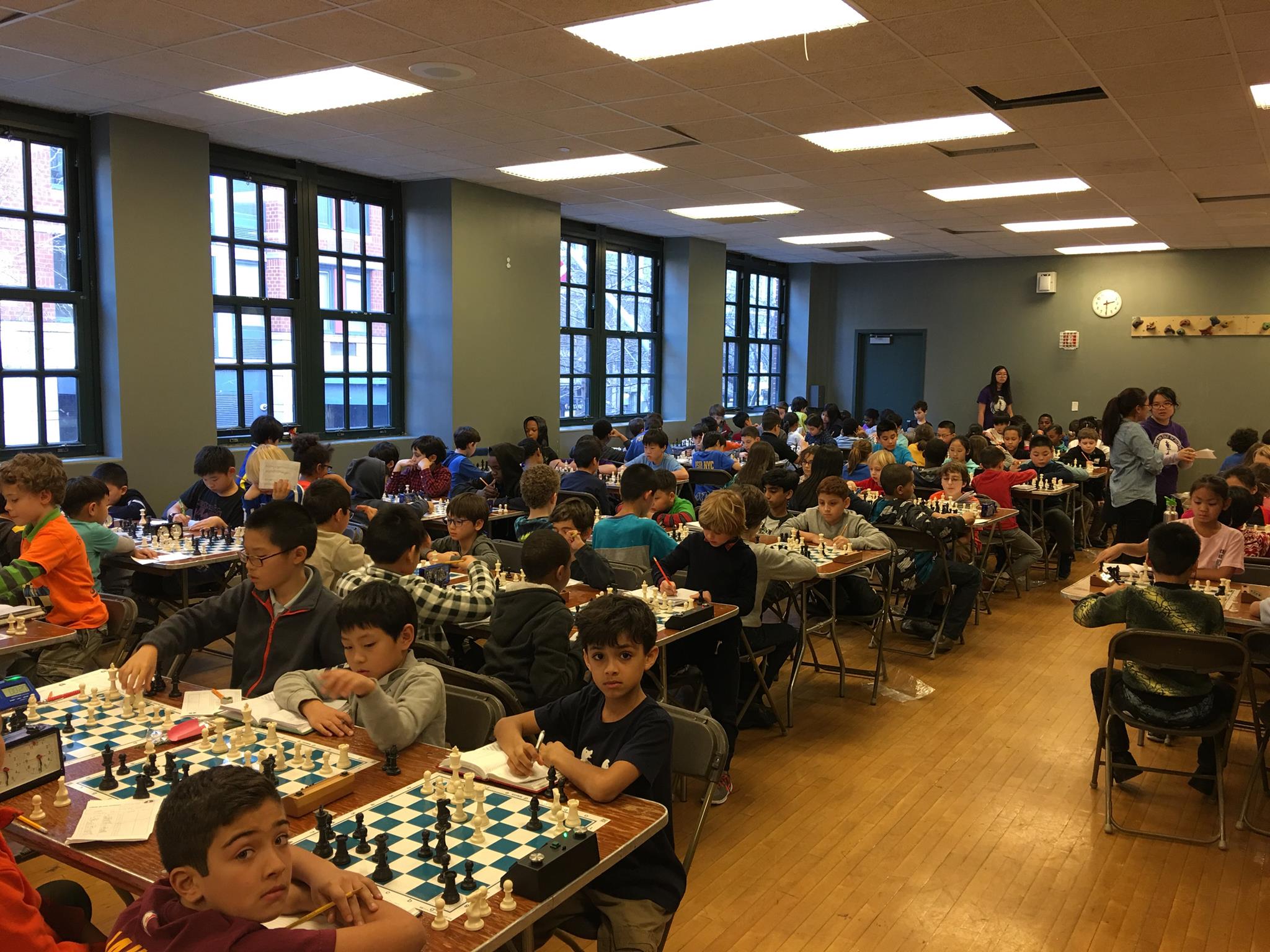 Students check out the CCPS winter chess tournament